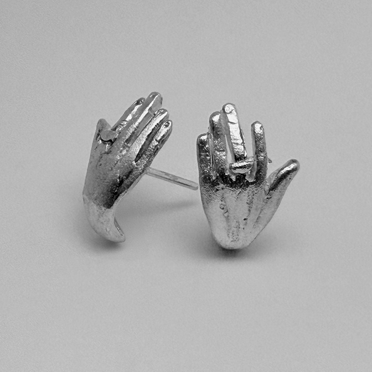 Hugging hands earrings