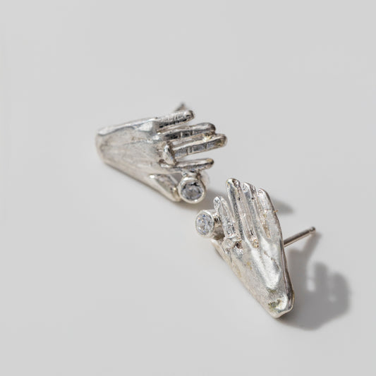 Spark hands earrings